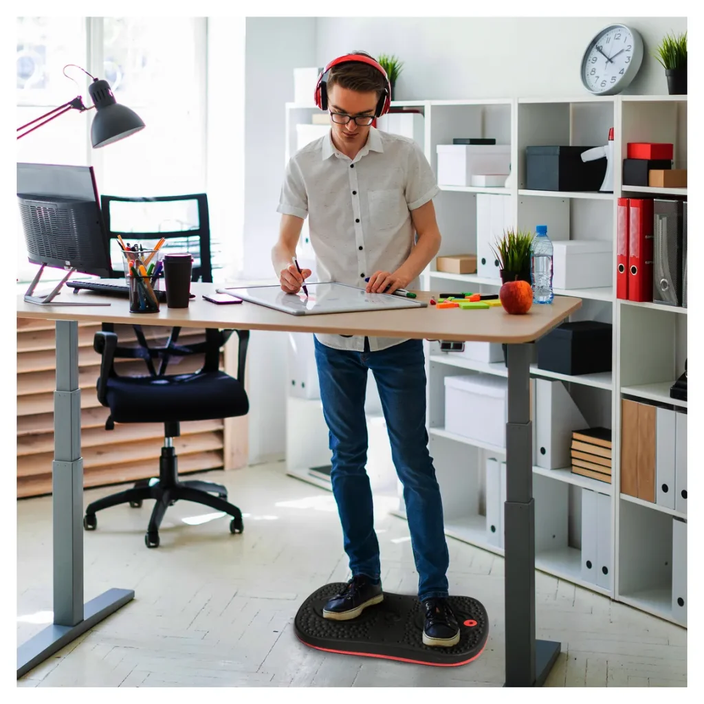 Photo by madisonliquidators.com - Balance Board Under Desk Footrest: Dual-Purpose Sitting and Standing Tool