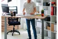 Photo by madisonliquidators.com - Balance Board Under Desk Footrest: Dual-Purpose Sitting and Standing Tool