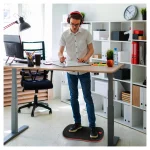 Photo by madisonliquidators.com - Balance Board Under Desk Footrest: Dual-Purpose Sitting and Standing Tool