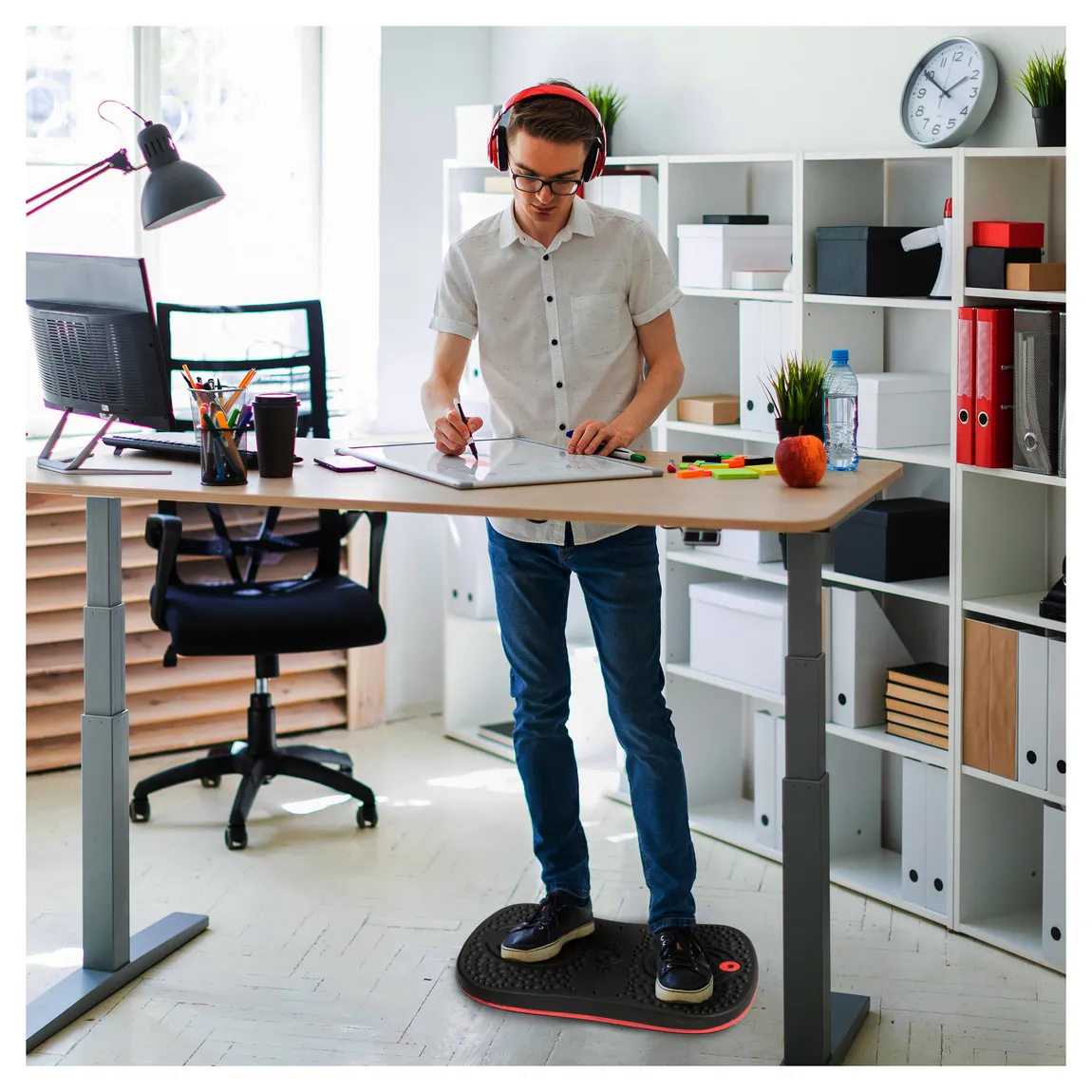 Photo by madisonliquidators.com - Balance Board Under Desk Footrest: Dual-Purpose Sitting and Standing Tool