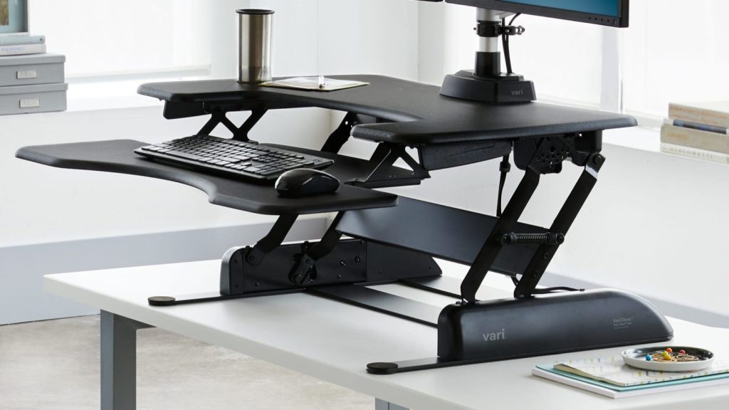 Photo by detroitchinatown.org - Gas Spring vs Scissor Mechanism in Standing Desk Converters