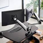 Photo by deskadvisor.org - How to Set Up an Ergonomic Monitor Arm on an Electric Standing Desk