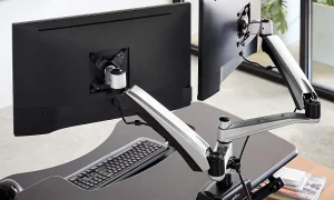Photo by deskadvisor.org - How to Set Up an Ergonomic Monitor Arm on an Electric Standing Desk