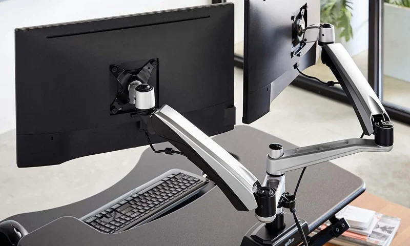 Photo by deskadvisor.org - How to Set Up an Ergonomic Monitor Arm on an Electric Standing Desk