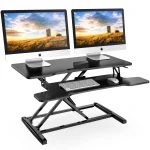 Photo by storage.googleapis.com - Standing Desk Converter vs Full Electric Standing Desk: Cost and Space Comparison
